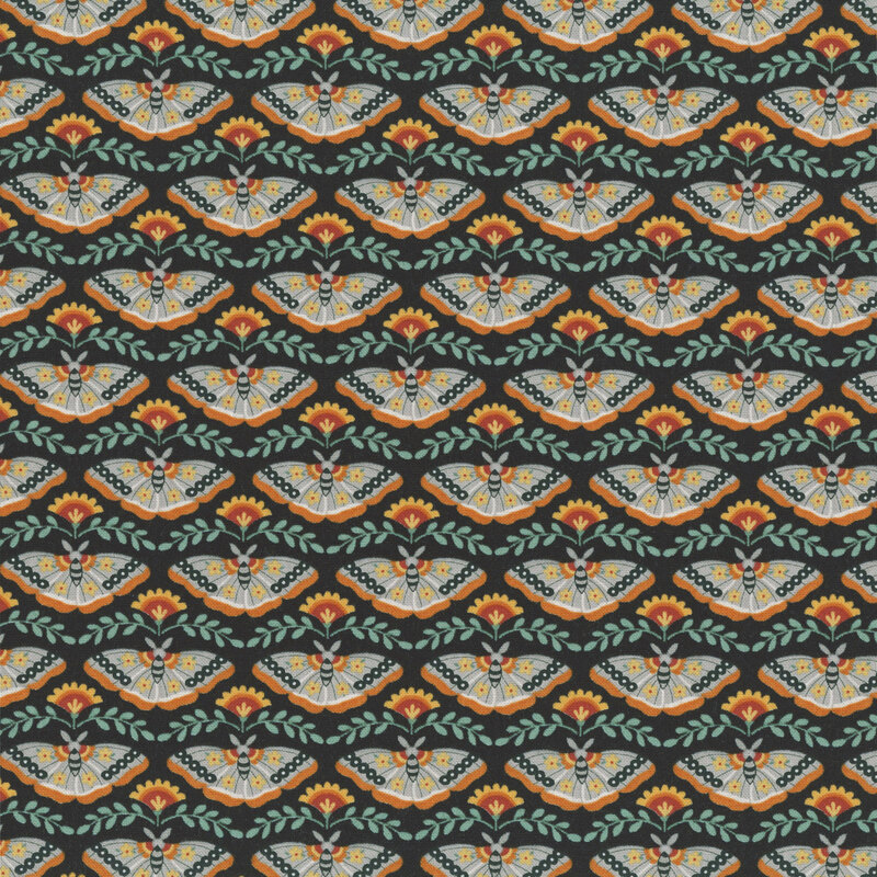 A black fabric with rows of moths, stylized flowers, and leafy vines.