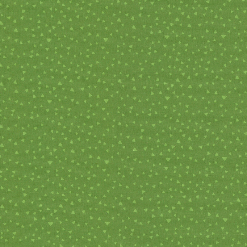grass green fabric with scattered triangle shapes in tonal hues.