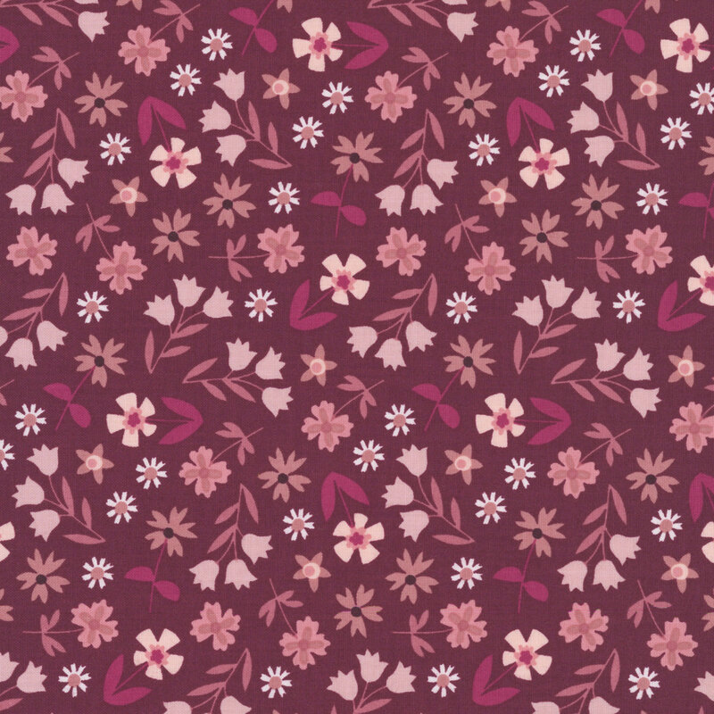 This mulberry purple fabric features a tossed design of mauve and orchid flowers. 