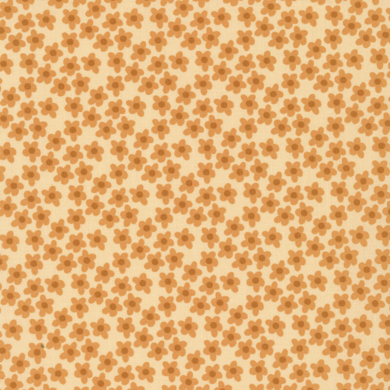 This butter yellow fabric features tossed golden yellow flowers. 