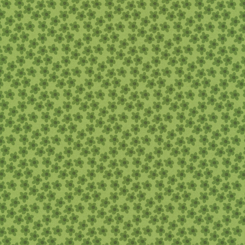 This leaf green fabric features tossed forest green flowers. 