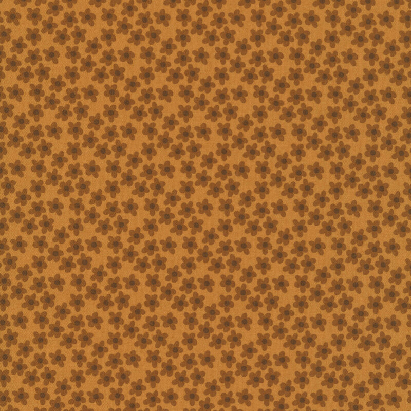 This suede brown fabric features tossed brown flowers. 
