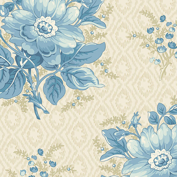 Cream fabric with vintage blue flowers and a textured, diamond-patterned background.