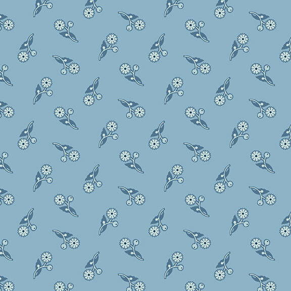 Light blue fabric with dandelion flowers that rotate 90 degrees in each direction.