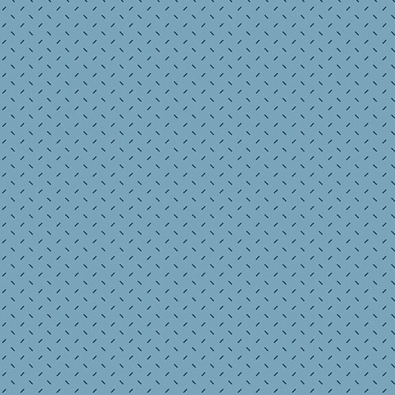 Blue fabric with short lines alternating in a lattice pattern.
