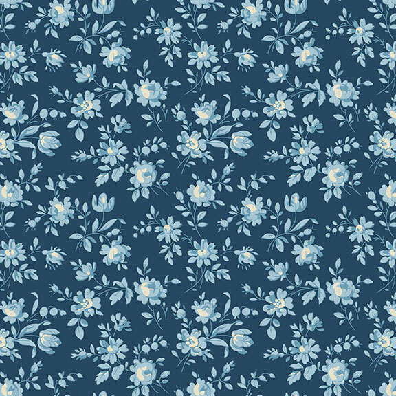 Dark teal fabric with a pattern of florals on leafy vines.