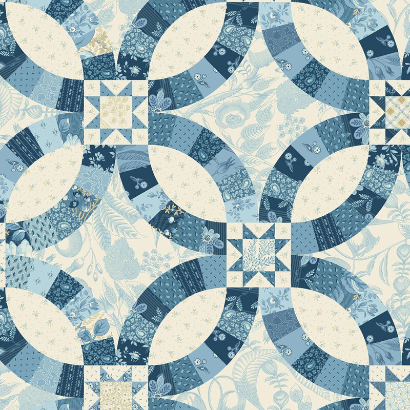 Cream cheater print fabric with a sawtooth star design.
