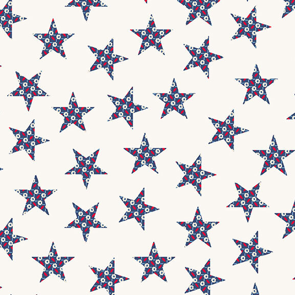 A cream fabric with scattered navy blue stars and white florals.