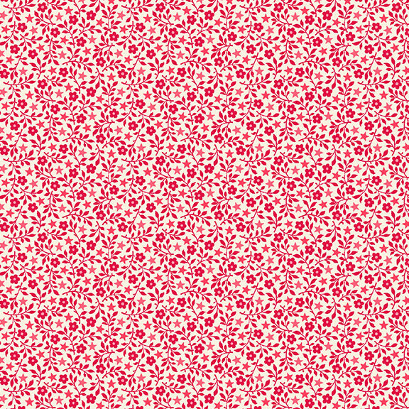 A white fabric with packed red florals, stems, and stars.