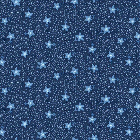 A navy blue fabric with blue flowers, stars, and scattered dots.