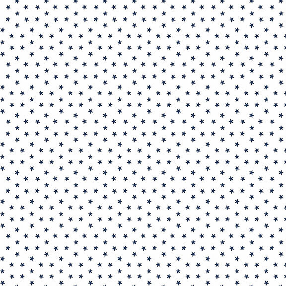 A white fabric with scattered navy blue stars