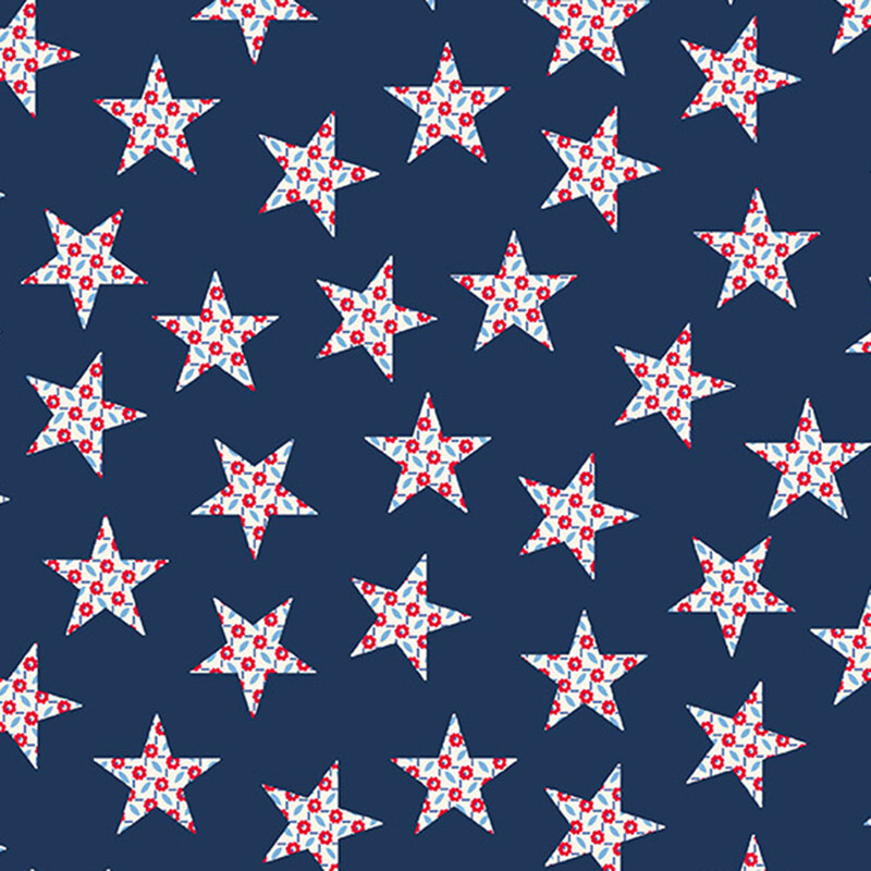 A navy blue 108" fabric with scattered white stars containing red florals.