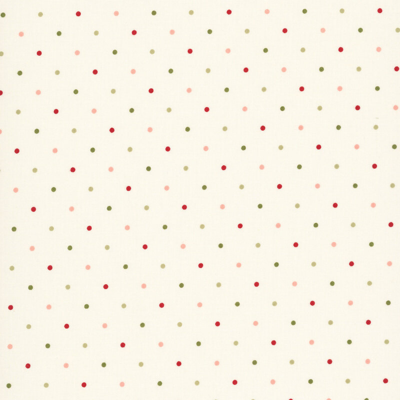 red, pink, and green polka dots on a cream background.
