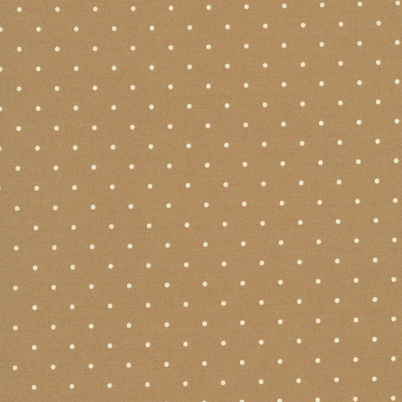  white polka dots on a tan background.