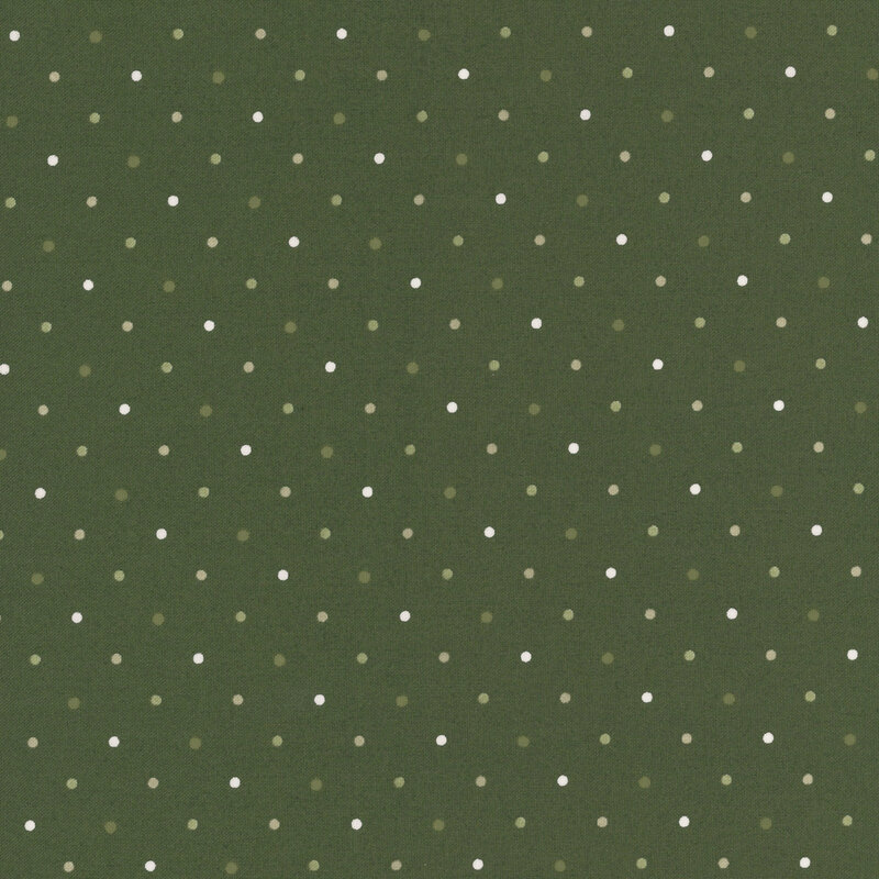 green and white polka dots on a dark loden green background.