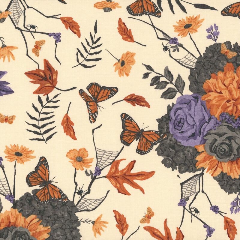 Cream fabric with a scatter of floral bunches, spiders, spiderwebs, Monarch butterflies, moths, and falling leaves.