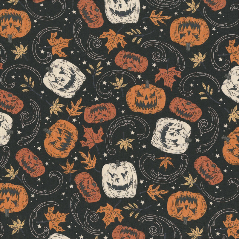 Black fabric with a tossed pattern of swirls, leaves, stars, and orange and white pumpkins.