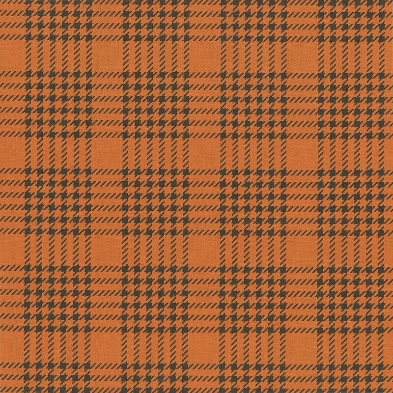 Pumpkin orange fabric with a simple dashed-line jet-black gingham.