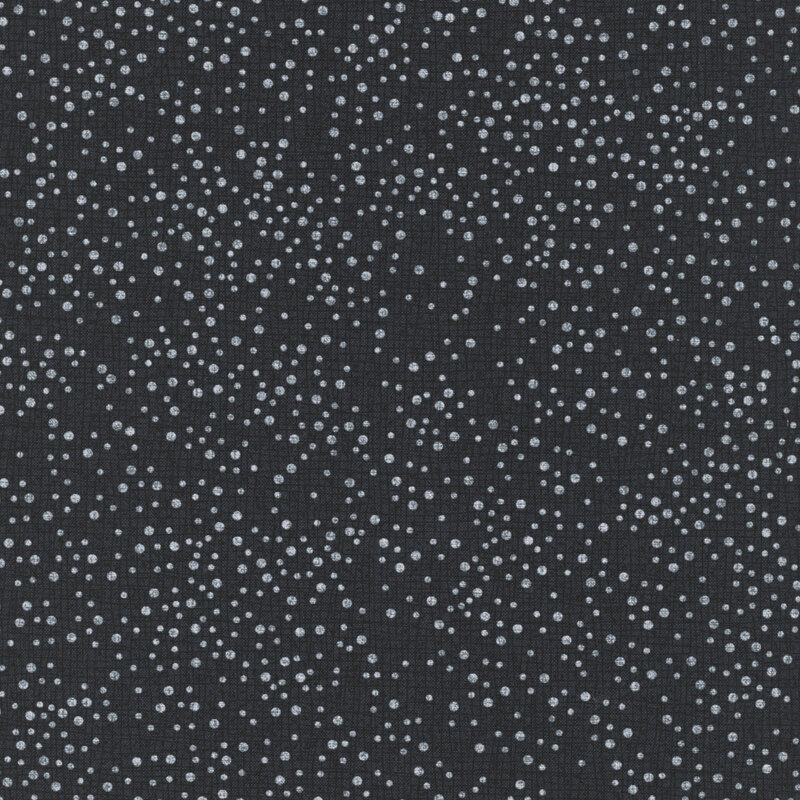 scattered white dots in varying sizes across a softly textured soft black background.