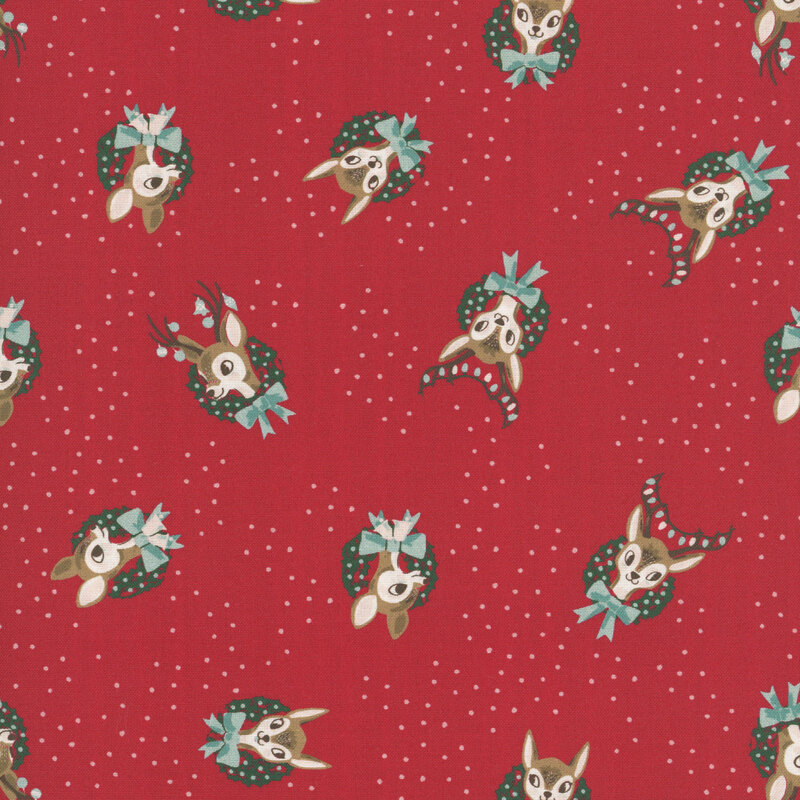 Christmas red fabric with scattered pastel red dots with tossed reindeer adorned with bows and a Christmas wreath.