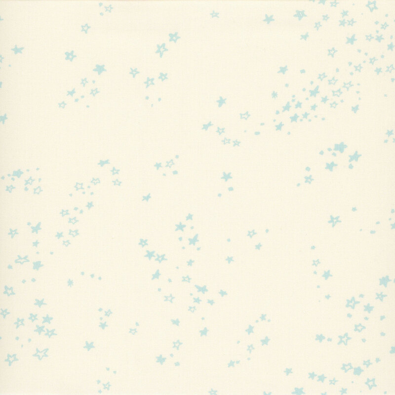 Cream fabric with a scattering of ice-blue stars in various styles.