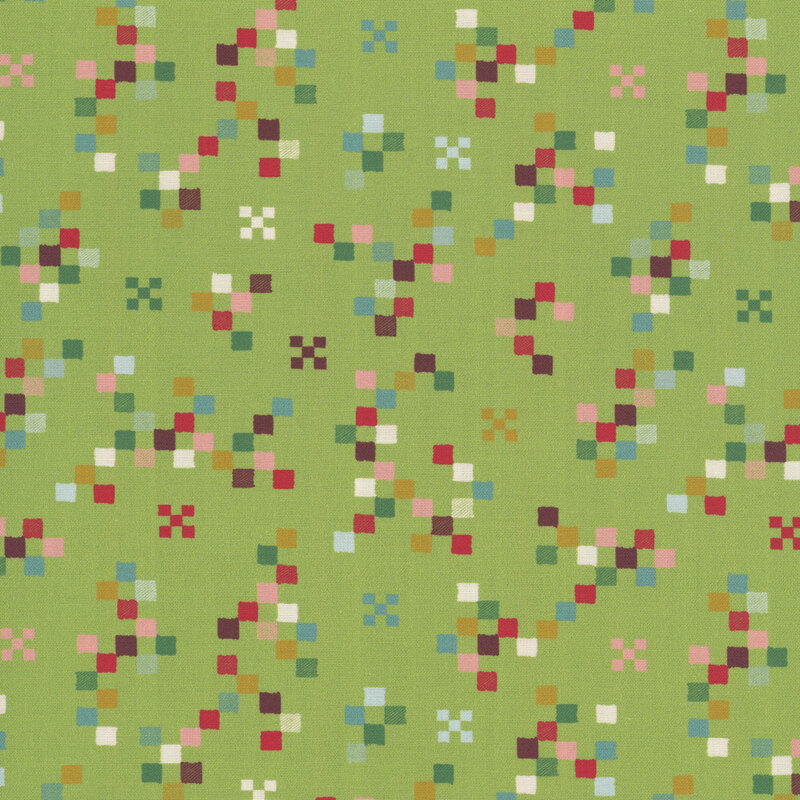 Fern green fabric with a scattered geometric design of squares in a medley of Christmastime colors.