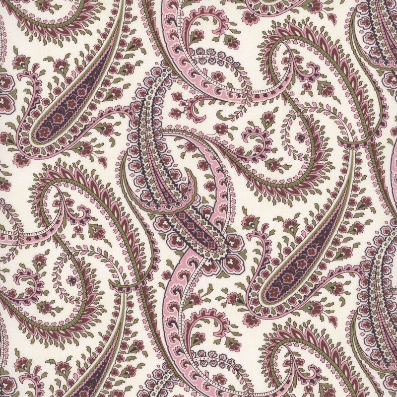 White fabric a swirling pattern of paisley designs and abstract florals.