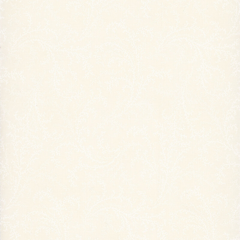 White fabric with a tonal pattern of swirling vines and dots.