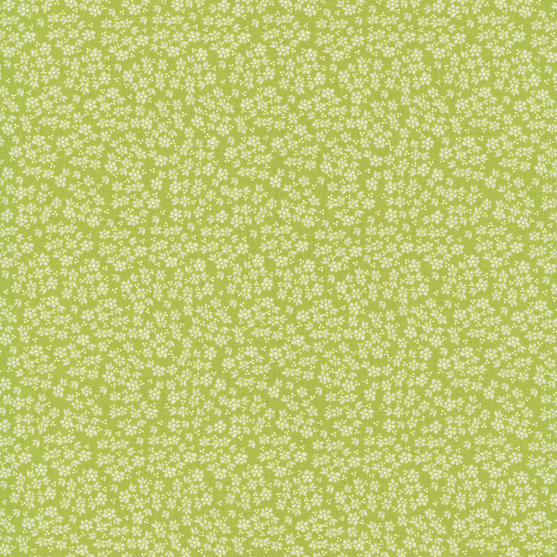 A lime green fabric with light lemongrass flowers.