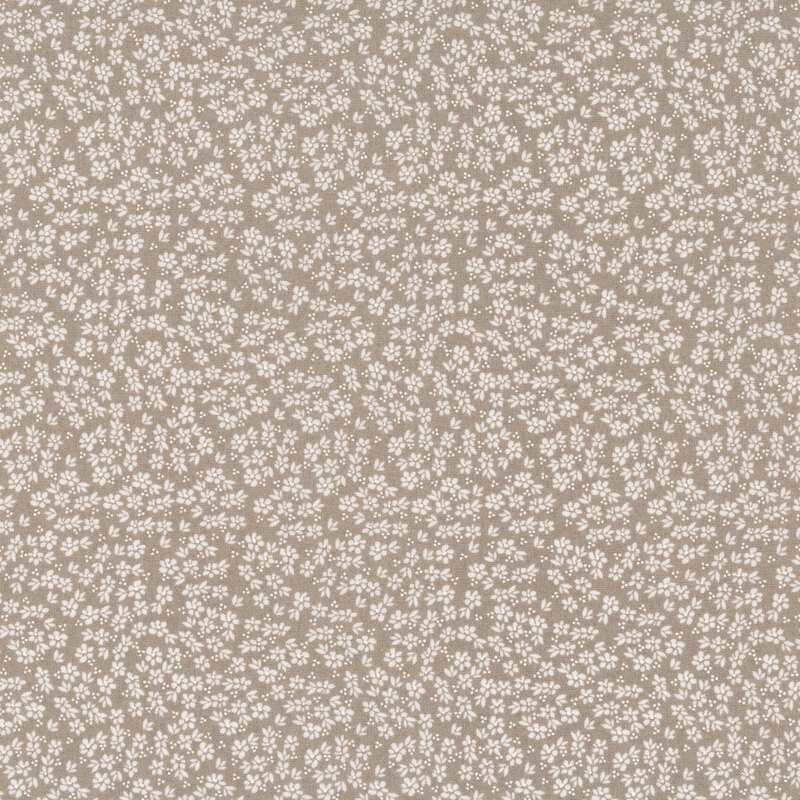 A stone gray fabric with packed white flowers.