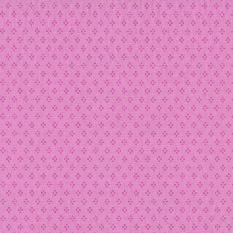 A mauve fabric with purple four-dot diamonds.