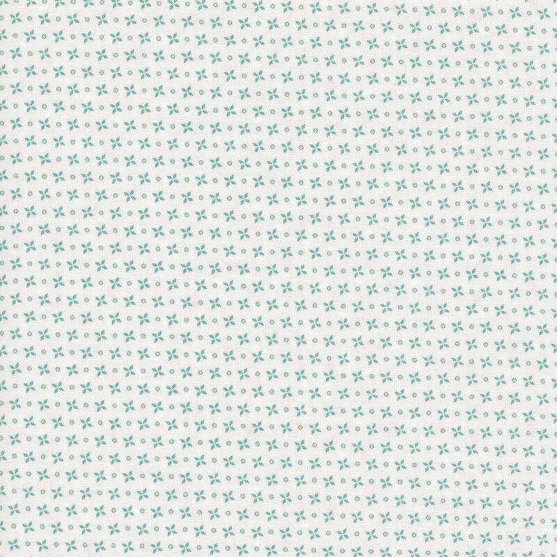 A white fabric with teal four-petal flower motifs and circles.