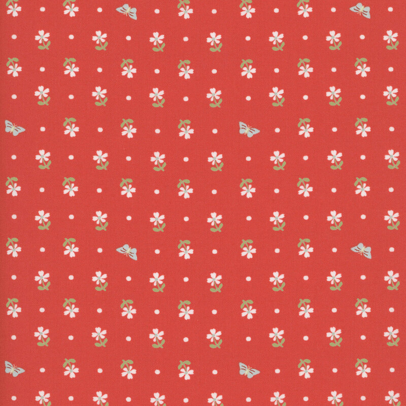 tomato red fabric featuring rows of tiny white flowers with soft green leaves, white dots, and delicate pale blue butterflies
