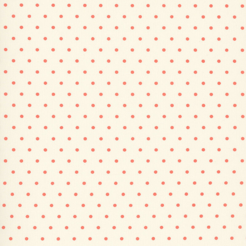coral polka dots on a soft ivory background.