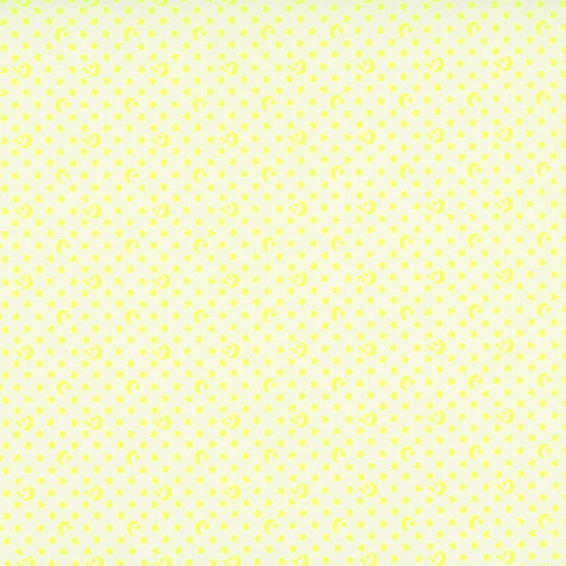 A cream fabric with scattered stars and crescent moons.