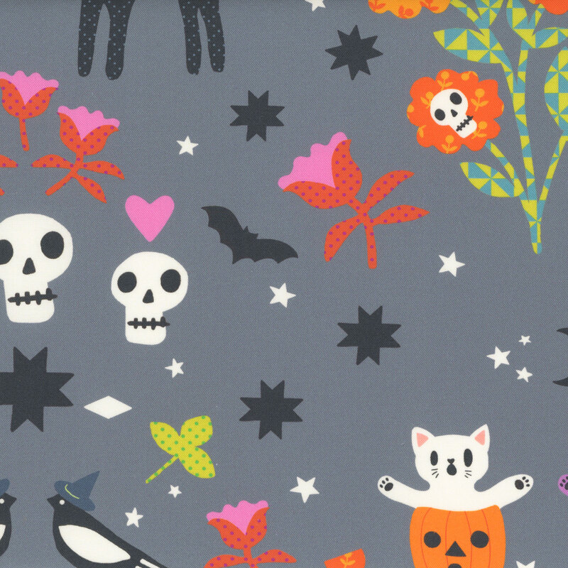 A gray fabric with scattered Halloween motifs.