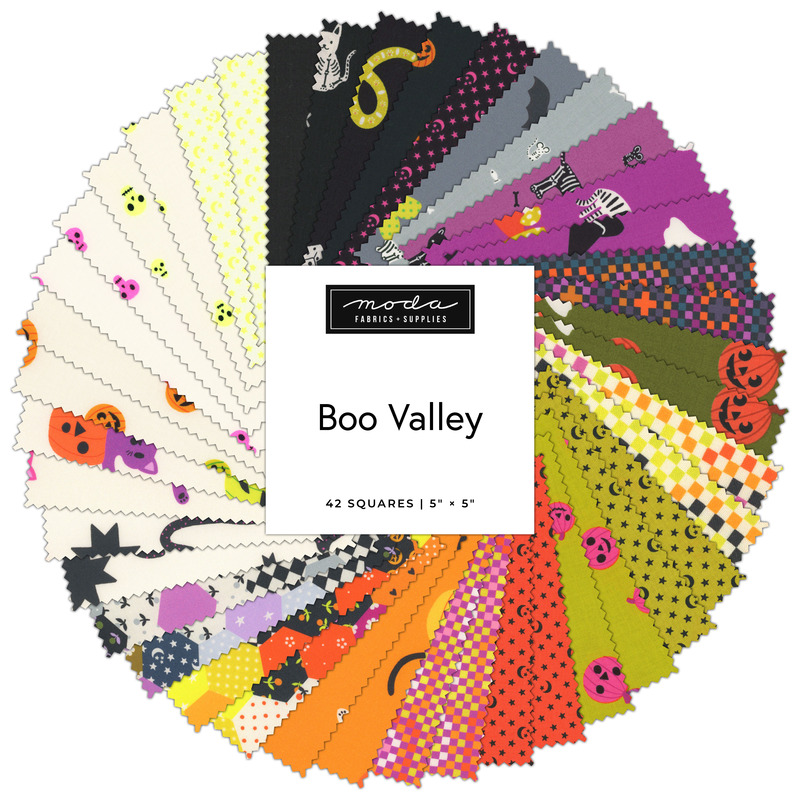 A collage of fabrics featured in the Boo Valley Charm Pack by Ruby Star Society for Moda Fabrics.