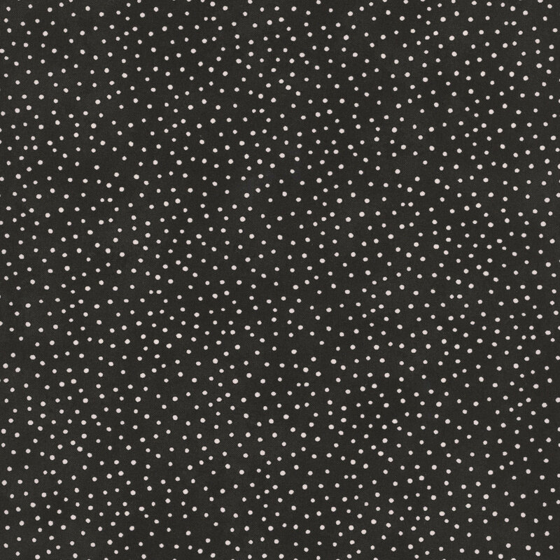 Black fabric with a pattern of scattered white dots.