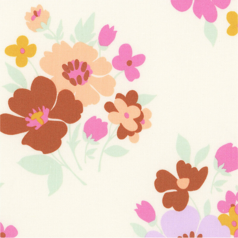 Cream fabric with a scattered design of novel floral bunches.