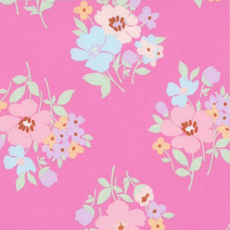 Bubblegum pink fabric with a scattered design of novel floral bunches.
