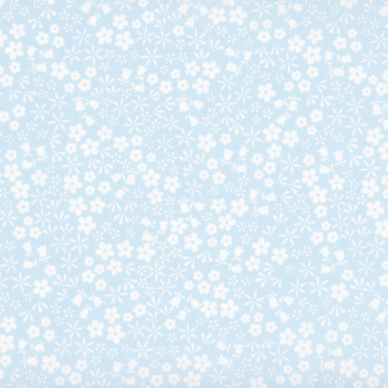 Baby blue fabric with a scattered pattern of white floral blooms.