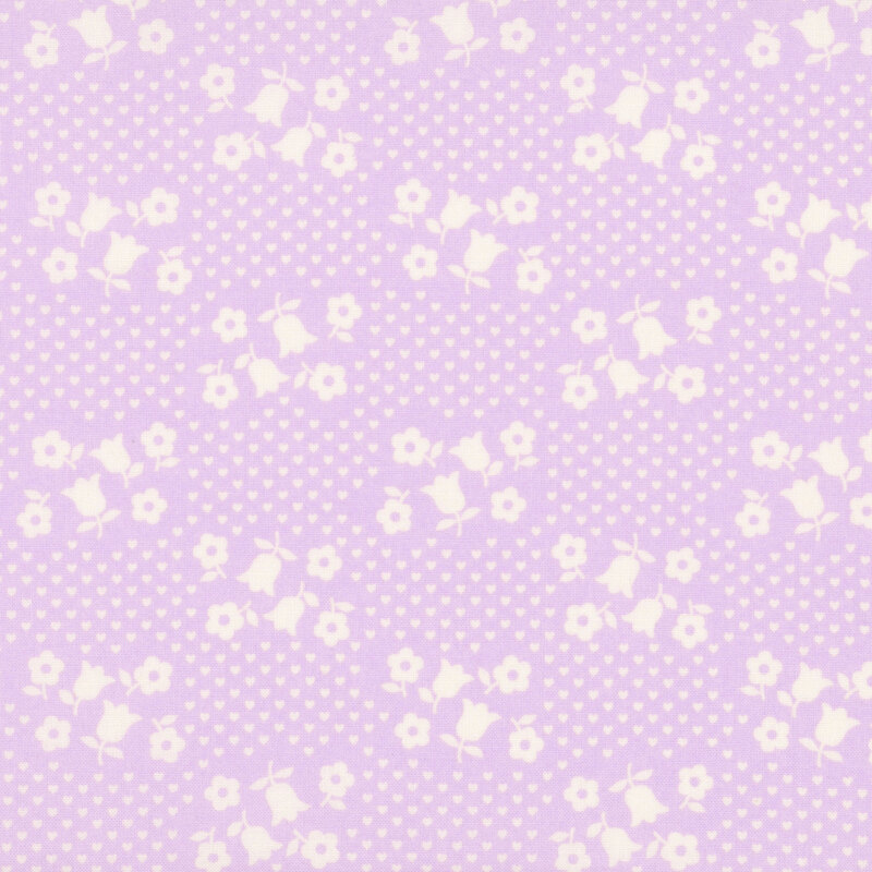 Lilac purple fabric with a scattered design of small white hearts and groups of florals.