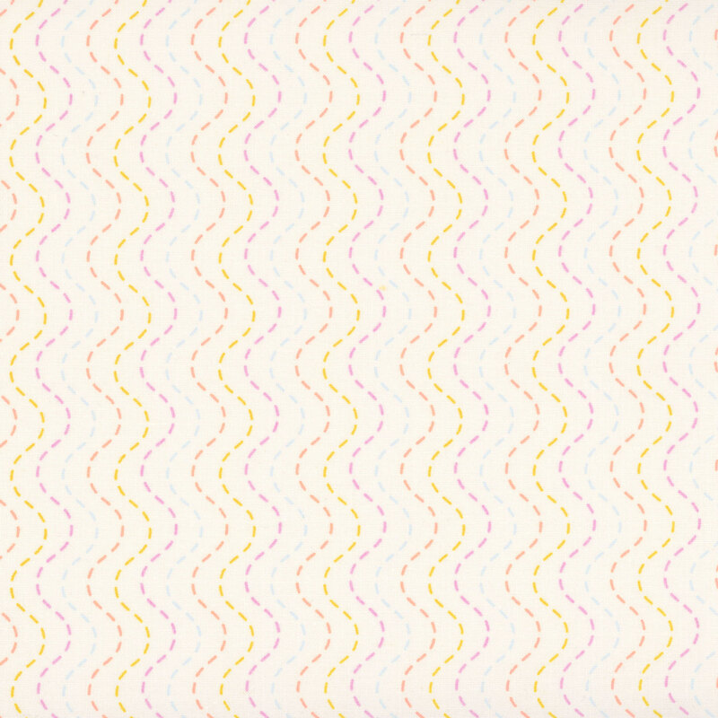 Cream fabric with a multicolored wavy, dashed-stripe design.