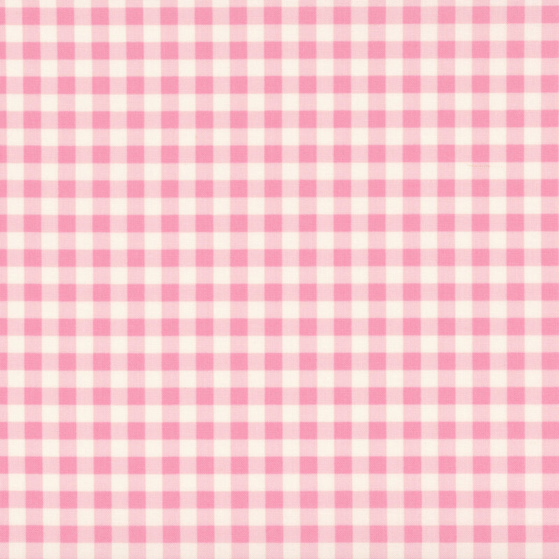 Cream fabric with a dense pink and salmon pink gingham design.