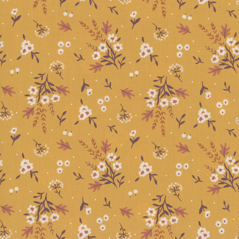 scattered bouquets of white flowers, rust colored leaves, berries, and delicate sprigs on a golden mustard background