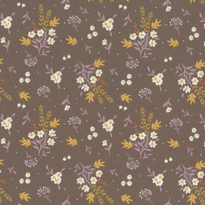 scattered bouquets of white flowers, golden leaves, berries, and delicate sprigs on a dark taupe background