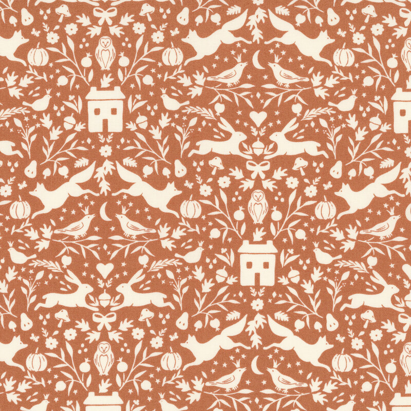 cream woodland motifs of foxes, rabbits, owls, birds, cottages, pumpkins, acorns, mushrooms, and leafy florals on a rust background
