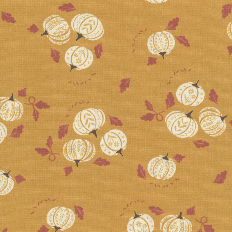 clusters cream pumpkins, accented with scattered fall leaves on a dark gold background.