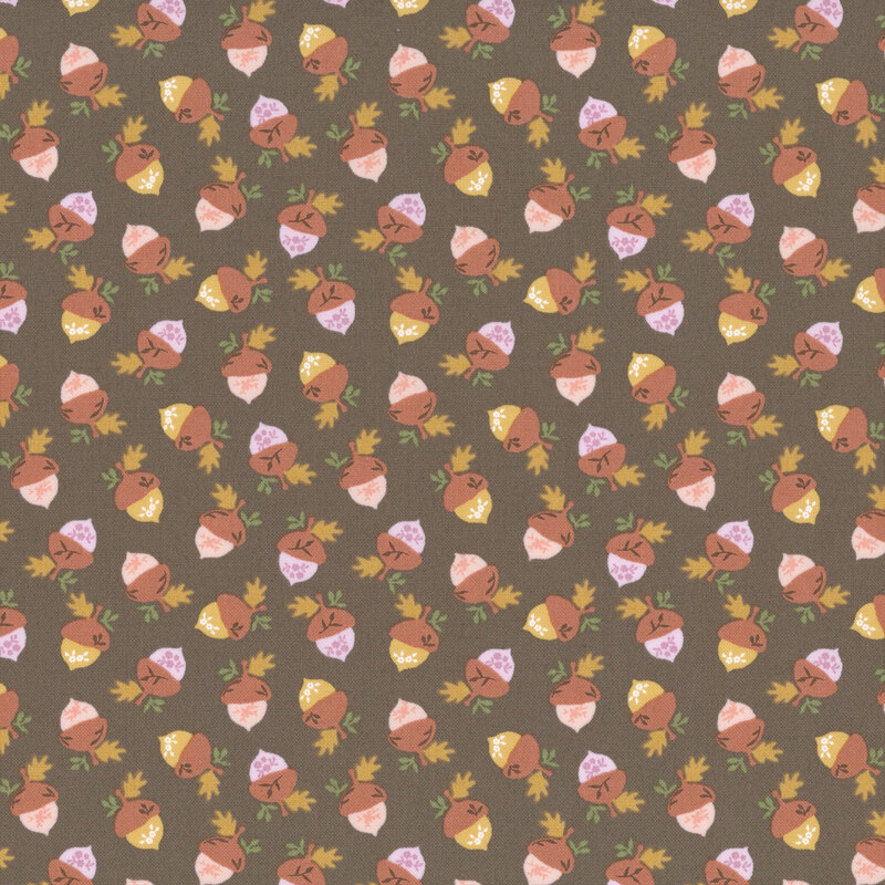 in daffodil yellow, pale peach, and soft lavender hues, accented with tiny golden and green leaves on a dark taupe background.
