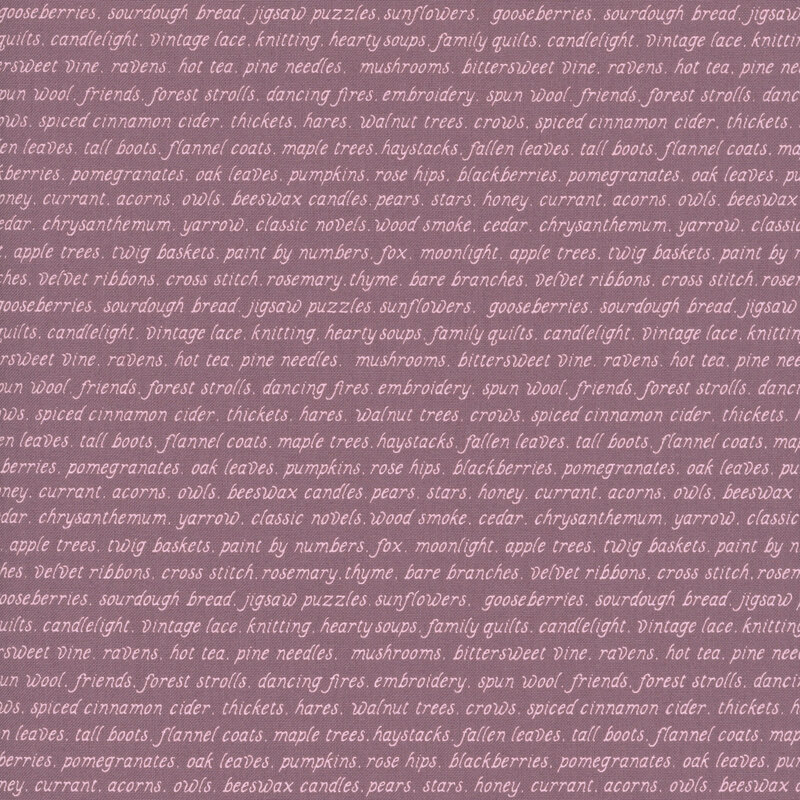 muted plum fabric with repeating rows of tonal fall-themed words.